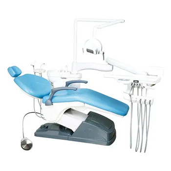 Стоматолог помогает стоматологическому комплексному терапевтическому креслу стоматологическое кресло терапевтический аппарат стоматологический комплексный стоматологический стол стоматологическое стоматологическое кресло стоматологическое